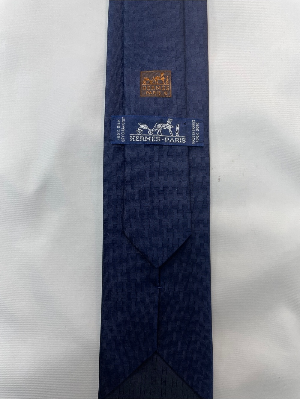 Hermès 100% Silk Men’s Tie Navy Blue “H” Tonal Texture With Horsheshoe